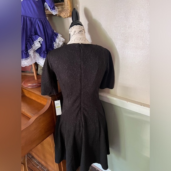 London Style Collection Black
Knit Dress Size 4 NWT 72.00 - Picture 4 of 5